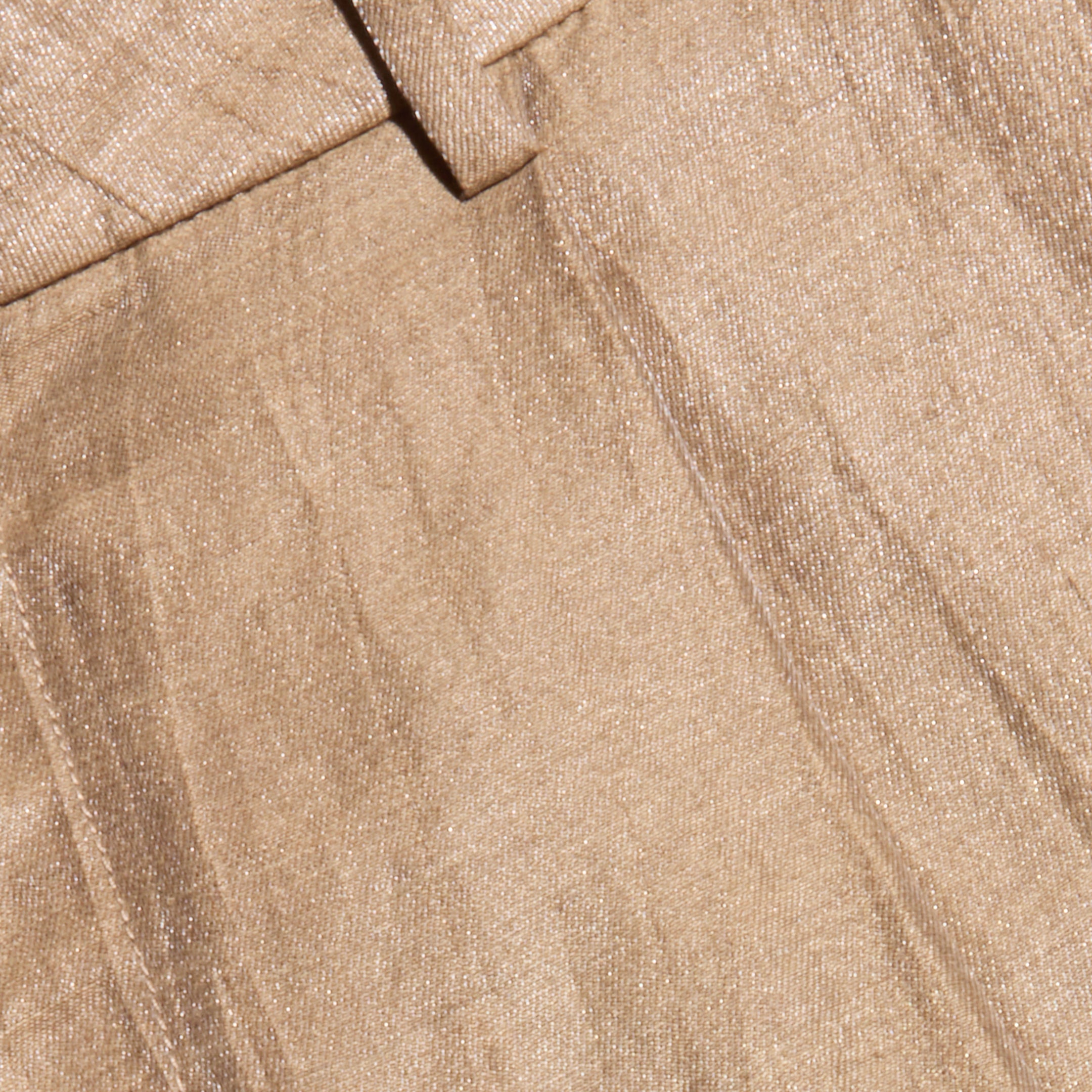 Close-up of the Allanah Linen-Blend Trouser in latte brown, featuring a visible seam and belt loop, showcasing the textured linen-blend fabric and its subtle sheen.