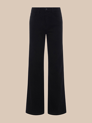 The Scottie Wide-Leg Jean is shown on a beige background, featuring a high-rise waist, front button, and classic five-pocket style crafted from premium stretch denim.