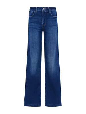 The Scottie Wide-Leg Jean by L'AGENCE is a high-waisted, stretch denim jean in blue featuring a contoured waistband, button and zip closure, front and back pockets, wide legs, and subtle thigh fading.