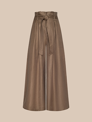 The Lowen Linen-Blend Pant features a wide-leg, high-rise silhouette with a belted paper bag waist in brown linen blend, shown on a light beige background.