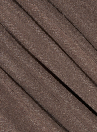 Close-up of the Palmer Satin Pant in brown, showcasing fabric with diagonal folds and a soft, velvety sheen reminiscent of premium satin. The surface appears smooth, with shadows accentuating the depth and drape—perfect for crafting elegant high-rise silhouettes.