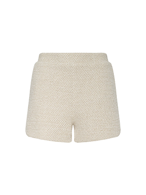 Radlee Knit Short: Beige textured women's high-waisted dolphin shorts with a subtle woven pattern and elastic waistband, shown against a plain white background.