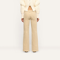Back view of beige, low-rise, wide-leg stretch denim Joanne Low-Rise Wide-Leg Jean.