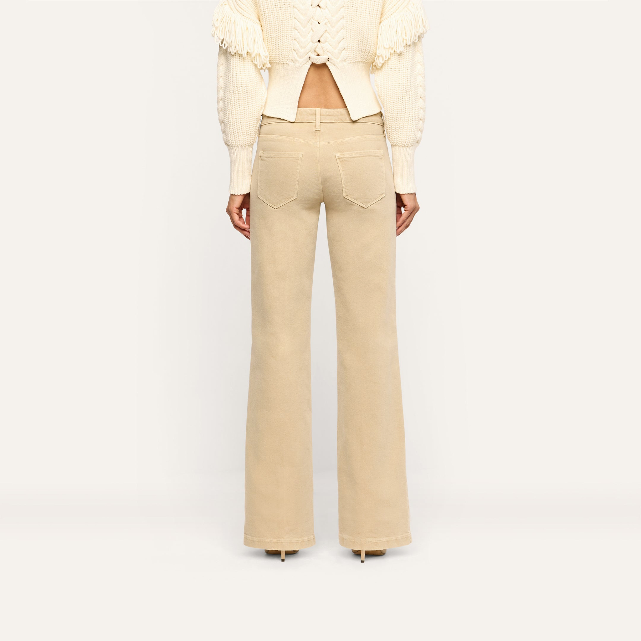 Back view of beige, low-rise, wide-leg stretch denim Joanne Low-Rise Wide-Leg Jean.