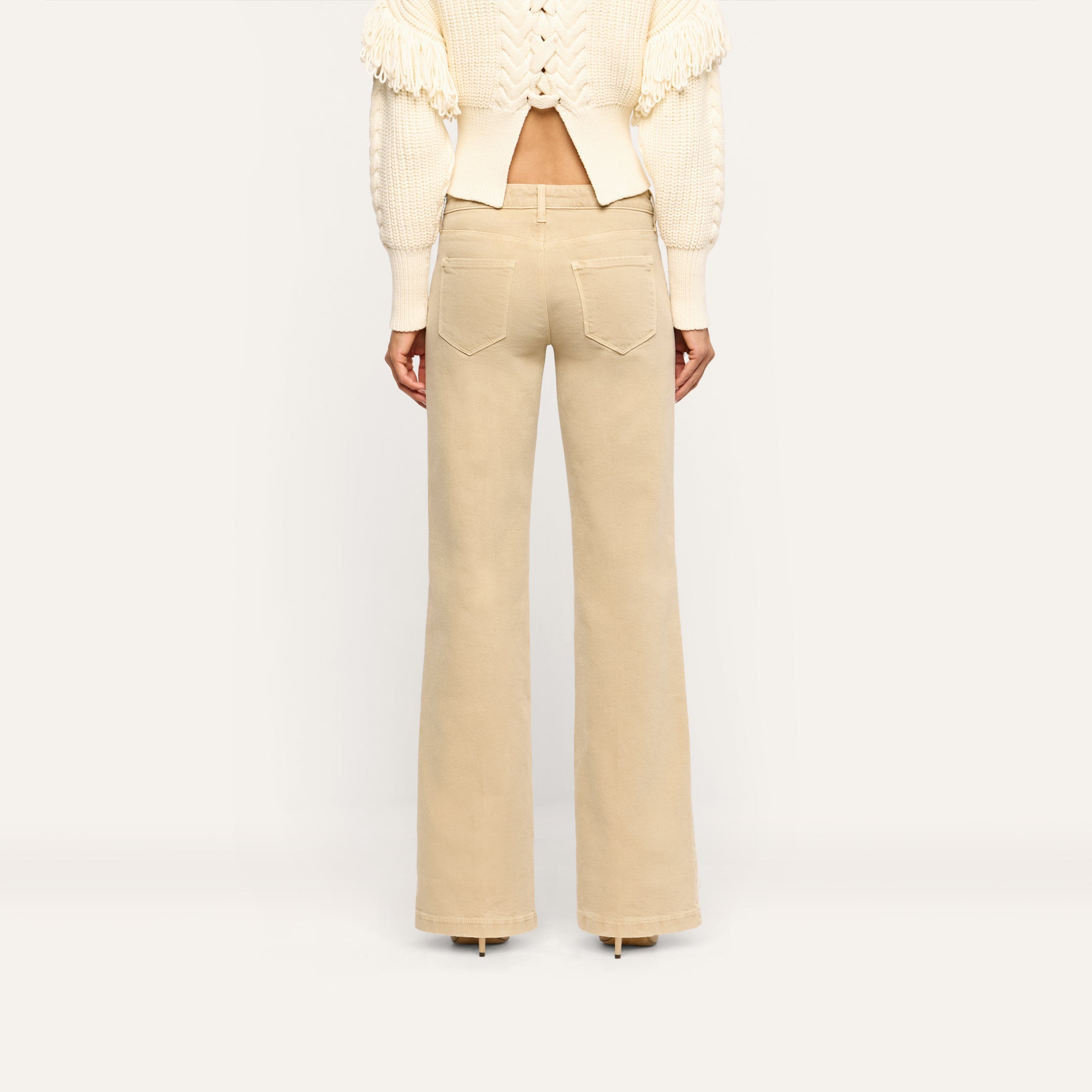 Back view of beige, low-rise, wide-leg stretch denim Joanne Low-Rise Wide-Leg Jean.