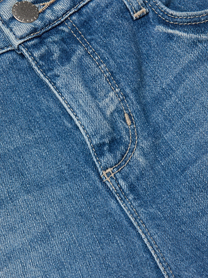 Close-up of L'AGENCE Beau Wide-Leg Jean highlighting the front pocket, stitching details, and a metal button at the waistband.