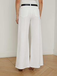 A person is shown from the back wearing the Beau Wide-Leg Jean with a black belt and tan heels against a plain background.