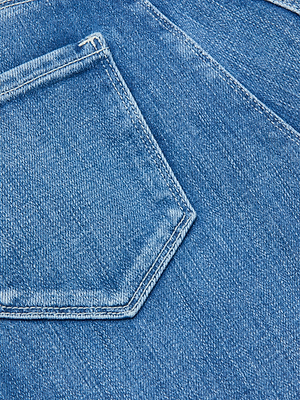 Close-up of the Quincy Wide-Leg Jean in blue denim with an aged indigo wash, highlighting the high-rise fit, back pocket, and seam details.