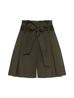 The Damira Short in olive green cotton-blend poplin features an ultra-high waist, wide legs, front pleats, and a self-tie bow belt at the waist, shown on a white background.