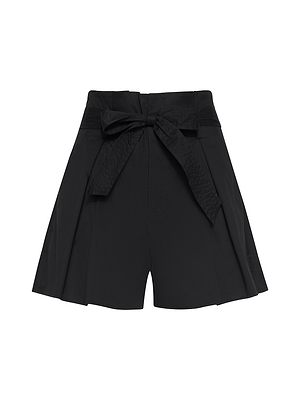 The Damira Poplin Short features an ultra-high waist, wide legs, front pleats, and a matching fabric belt in a bow, made from comfortable stretch poplin.