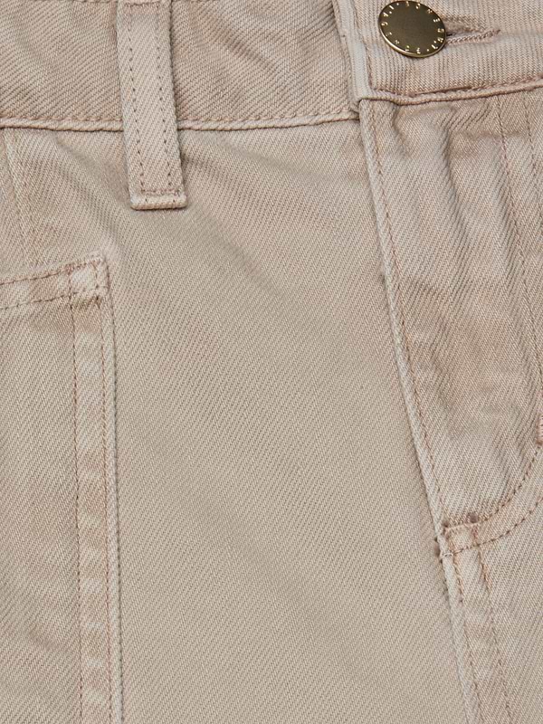 Close-up of the Cody Cropped Barrel-Leg Jean in beige, made from all-cotton denim, showing a front pocket, belt loop, waistband stitching, and a metal button.