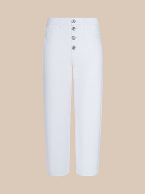 The Liora Cropped Jean features a white high-rise, straight-leg fit with four visible silver buttons and front pockets, displayed on a beige background.