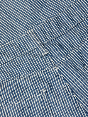Close-up of blue and white indigo stripes on lightweight fabric of the Amara Wide-Leg Pant, highlighting detailed stitching, seams, visible pocket, and waistband.