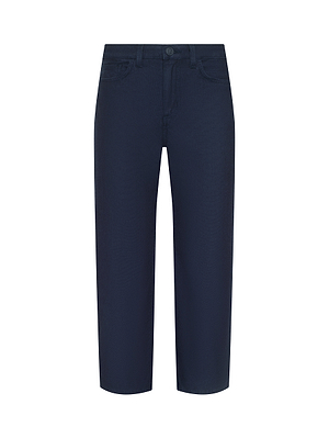 The Mallis Bow-Leg Jean in dark indigo features a straight-leg cut, button and zipper closure, and front and back pockets, shown against a white background.