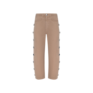 The Mallis Studded Bow-Leg Jean features a high waist and straight-leg silhouette in tan all-cotton denim. Button details run down the outer sides of both legs, while front pockets and a front button closure complete the look. The jeans are photographed against a plain white background.