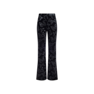 Frances Bootcut Trouser in black stretch velvet, featuring a high-waisted fit, subtle butterfly print design, and a slight flare at the bottom. Shown against a plain white background.