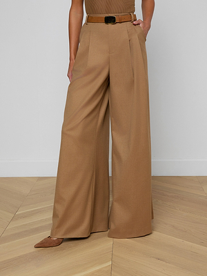 A person wearing the Chelsy Wide-Leg Pant in high-waisted brown suit fabric.