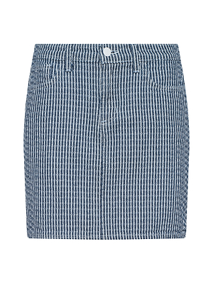 The Jolene Mini Skirt is a blue and white vertically striped denim mini skirt with belt loops, front pockets, and a front button closure. This mid rise style offers a fresh update to classic striped denim. Displayed on a white background.