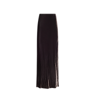 The Zeta Velvet Maxi Skirt, featuring a high waist and a smooth, slightly flowing silhouette in luxurious black velvet, is perfect for a minimalist wardrobe and is displayed against a plain white background.