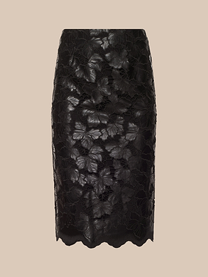 Royal Pencil Skirt: black knee-length classic pencil skirt featuring a sheer floral lace overlay and scalloped hem, shown against a beige background.
