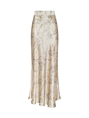 The Ryker Silk Maxi Skirt is a cream, satin skirt with minimalist elegance, showcasing a subtle gray floral vine pattern, high waist, and slightly flared hem.