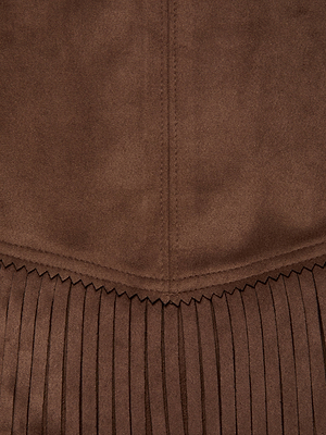 Close-up of the L’AGENCE Lyle Vegan Suede Mini Skirt in brown, featuring textured fabric with a zigzag seam and vertical pleats at the bottom to highlight stitching details.