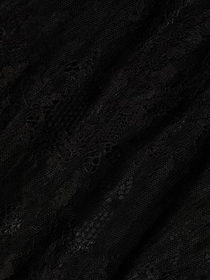 Close-up of the Alona Lace Maxi Skirt's Chantilly floral lace fabric, featuring a sheer mesh overlay and intricate delicate patterns. The soft, lightweight material is slightly gathered—ideal for elevating your night-out ensemble.