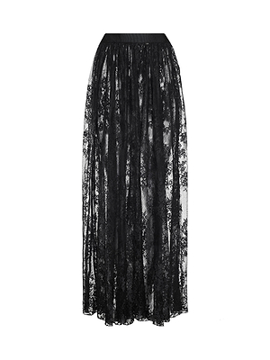 The Alona Lace Maxi Skirt is a long black sheer maxi skirt with a gathered waistband and Chantilly floral lace, ideal for an elegant night out, shown against a white background.