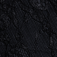 Close-up of the Raymonde Lace Maxi Skirt, crafted from black Chantilly lace with intricate floral and mesh patterns and a subtle shimmer throughout—ideal for creating a sophisticated look on a night out.