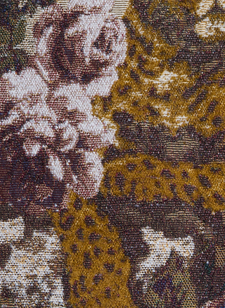 Close-up of the Marseille Mini Skirt, featuring Italian jacquard woven fabric with pink roses, white flowers, and green leaves set against a brown and gold background with intricate, textured detailing.