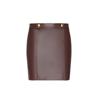 The Nolina Mini Skirt, crafted from mahogany brown vegan leather and featuring gold button details at the waistband, is displayed against a plain white background.