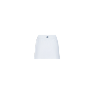 The Iga Tennis Skort, crafted from performance fabric with a subtle blue logo at the center front of the waistband, is a plain white mini skirt displayed against a white background.