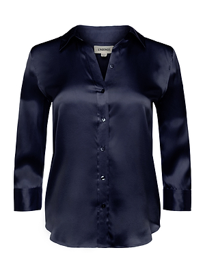 The Dani Silk Blouse is a long-sleeve, button-down top in shiny midnight blue satin, featuring a collar and subtly curved hem. LAGENCE label inside.