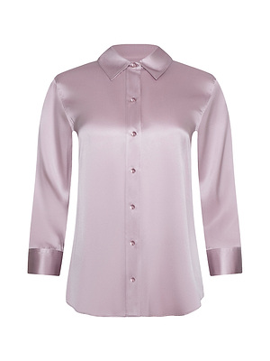 The Dani Silk Blouse is a long-sleeved, pastel lilac satin top with a collar and silk button-down front, displayed against a white background.