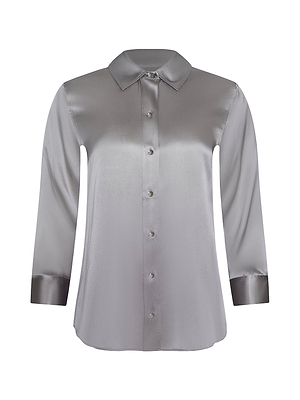 The Dani Silk Blouse is a shiny silver-gray, long-sleeve button-down with a pointed collar and wide cuffs.