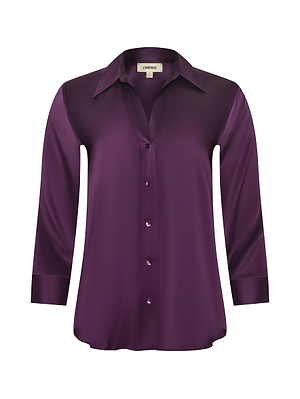 The Dani Silk Blouse by L'AGENCE is a deep purple, long-sleeved silk charmeuse button-down with a pointed collar and a slightly loose fit.