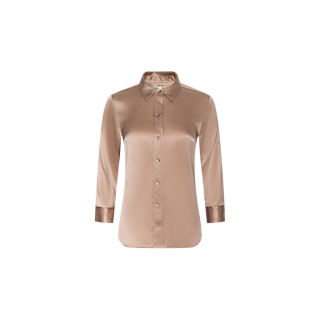The Dani Silk Blouse is a long-sleeve, button-down silk charmeuse top in light brown, designed with a pointed collar and buttoned cuffs, shown against a plain white background.
