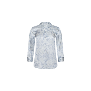The Dani Silk Blouse is a long-sleeve, silver satin silk button-down shirt featuring a subtle floral pattern, shown against a white background.