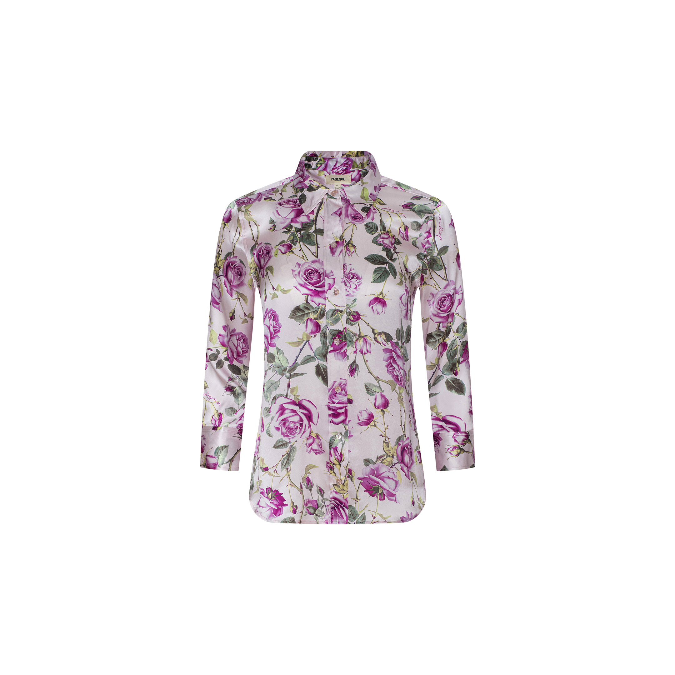 The Dani Silk Blouse is a long-sleeve, collared top featuring a purple and green rose print on a white background.