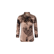 The Dani Silk Blouse is a brown satin long-sleeve top showcasing a palm leaf print, button-down front, and classic collar, displayed against a plain white background.