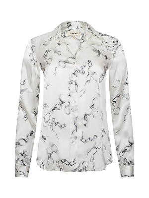 The Tyler Silk Blouse is a long-sleeve, white satin button-down with a gray chain print and a pointed collar, inspired by L'AGENCE. Shown on a white background.