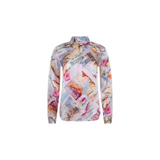 The Tyler Silk Blouse by L’AGENCE is a long-sleeve button-down shirt featuring a collage of colorful vintage travel posters and a pink postcard print, shown on a plain white background.