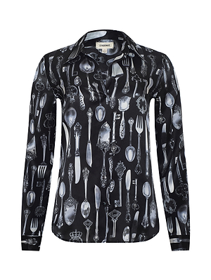 The Tyler Silk Blouse by L'AGENCE is a black, long-sleeved top featuring a distinctive vertical silverware print of vintage forks, spoons, and knives.