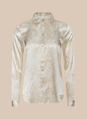 The Tyler Silk Blouse is a long-sleeve button-down with a classic collar and a light beige and cream paisley print, shown on a plain beige background.