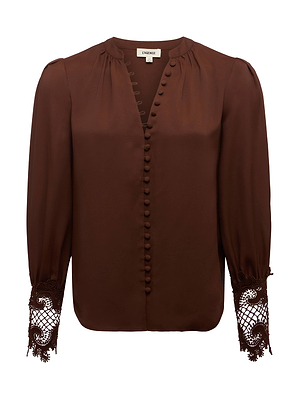 The Ava Blouse by L'AGENCE is a vintage-inspired top in hot fudge brown, accented with fabric-covered buttons and scalloped lace detailing at the cuffs.