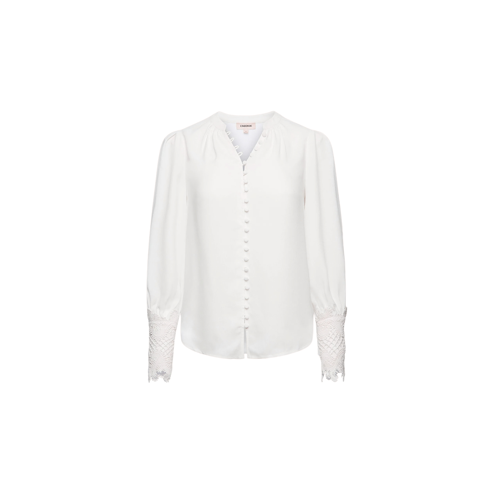 Ava Blouse in ivory, featuring fabric-covered buttons down the front and vintage-inspired scalloped guipure lace detailing on the cuffs, displayed on a plain white background.