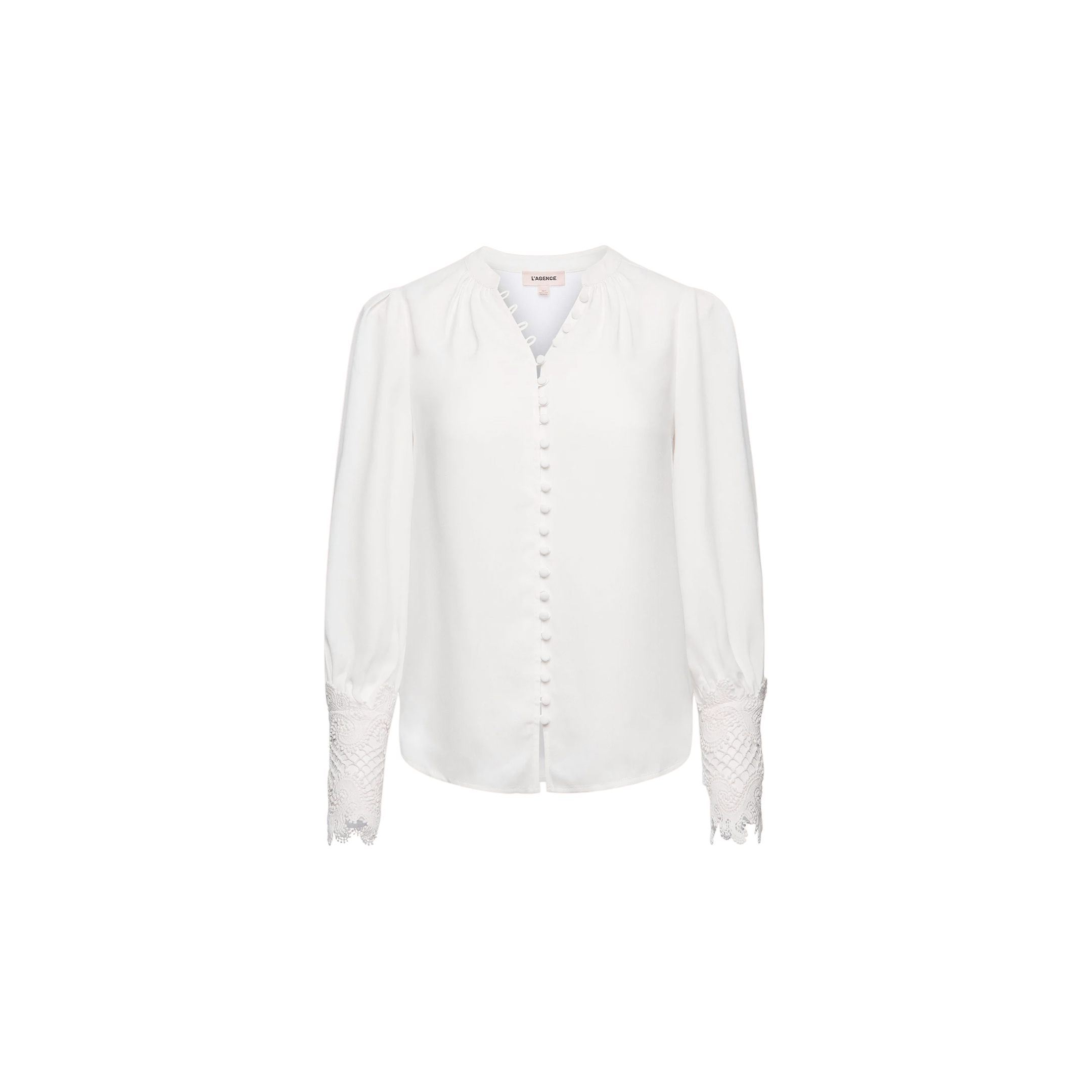 Ava Blouse in ivory, featuring fabric-covered buttons down the front and vintage-inspired scalloped guipure lace detailing on the cuffs, displayed on a plain white background.