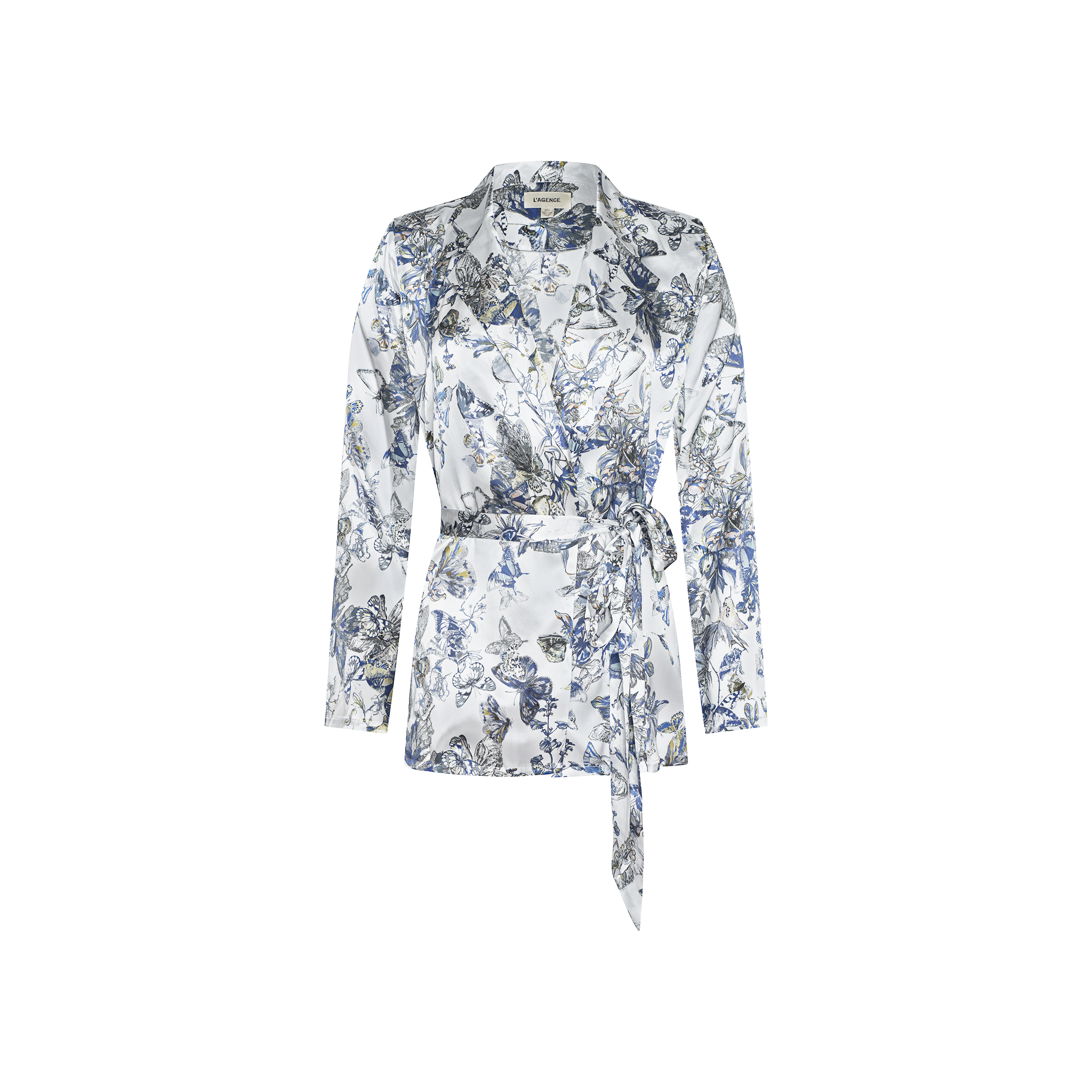 The Ciara Silk Robe Top is a long-sleeve, white belted blouse adorned with a blue and gray floral print, crafted from luxurious silk charmeuse and shown on a plain white background.