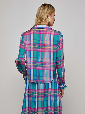 A blonde woman wearing gold earrings is seen from the back in the Cosette Plaid Shirt—a cropped, colorful button-down in blue, teal, pink, and white—paired with a matching skirt.
