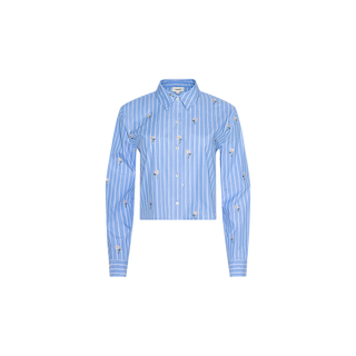 The Cosette Sequined Shirt is a blue, long-sleeved, striped poplin shirt featuring white vertical stripes, small embroidered designs, and a stylish cropped high-low hem, displayed on a plain white background.